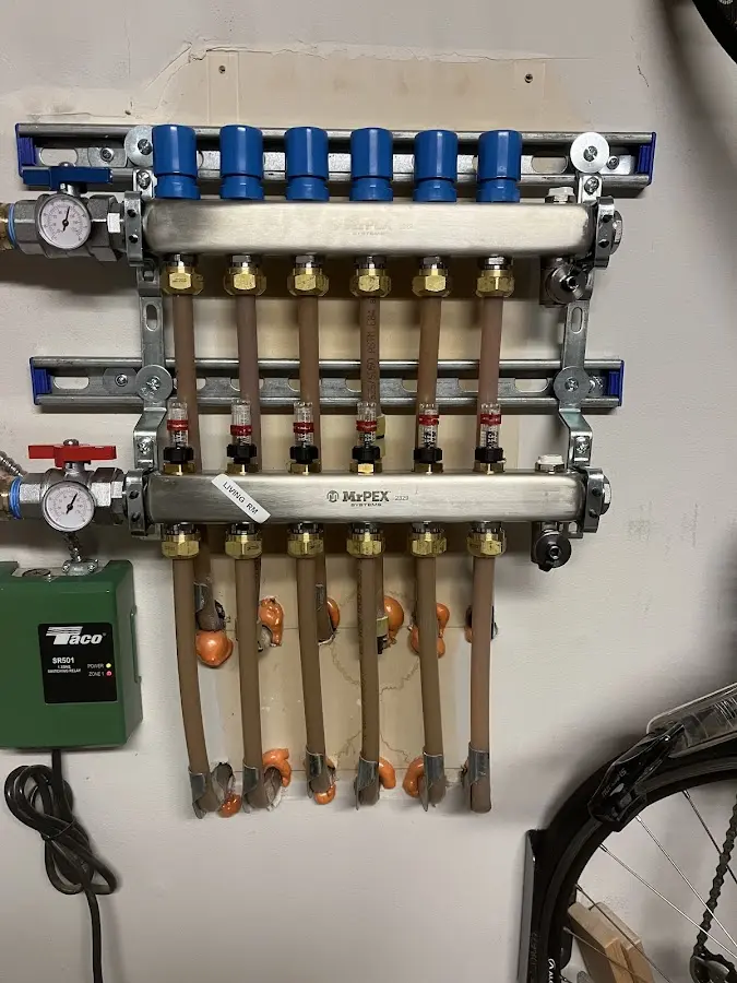 Plumber performing Gas Line Installation at a residential property in New Ipswich